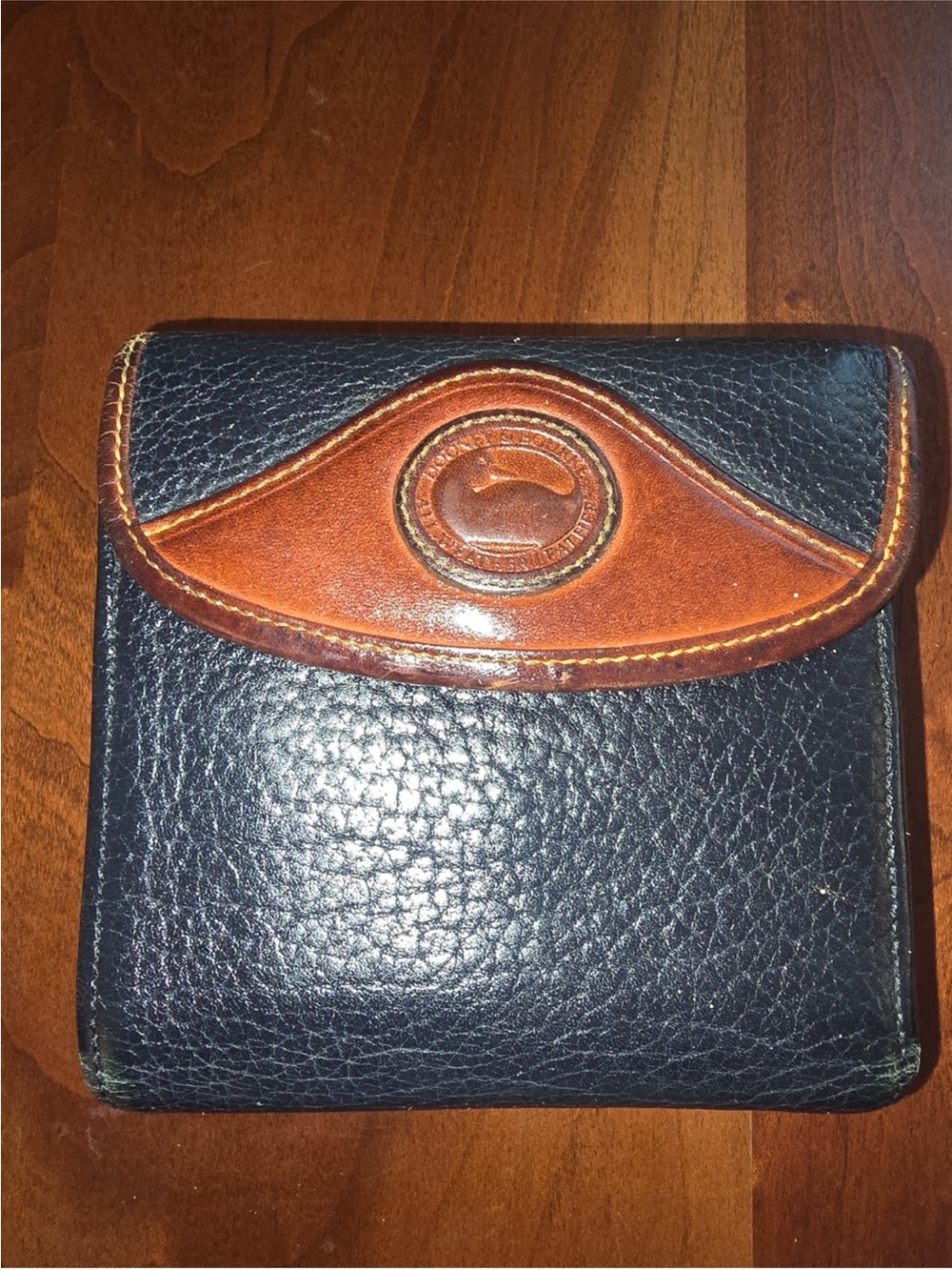 Dooney & Bourke Black and Brown Leather Bi-Fold Wallet vintage.